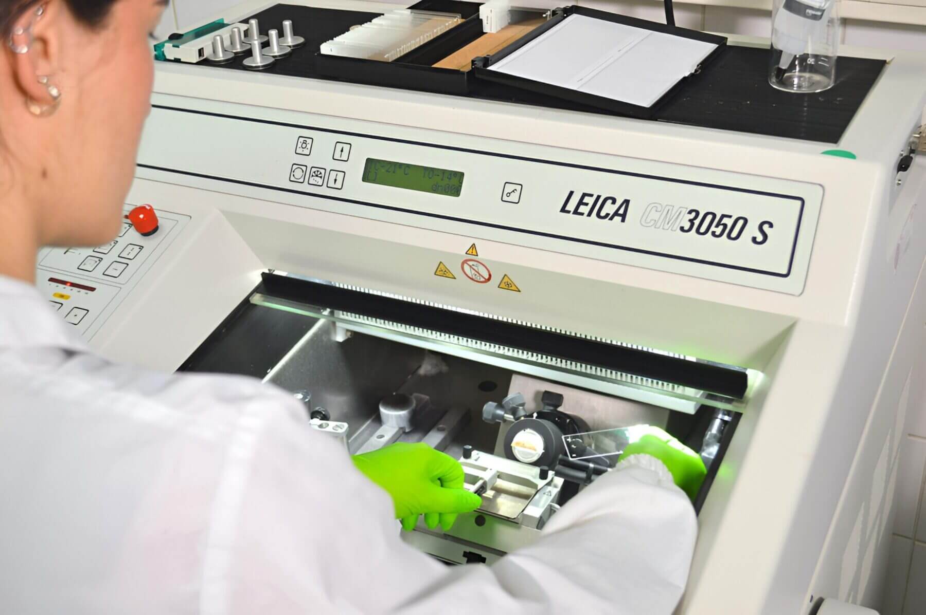 technician working on cryostat for Immunohistology