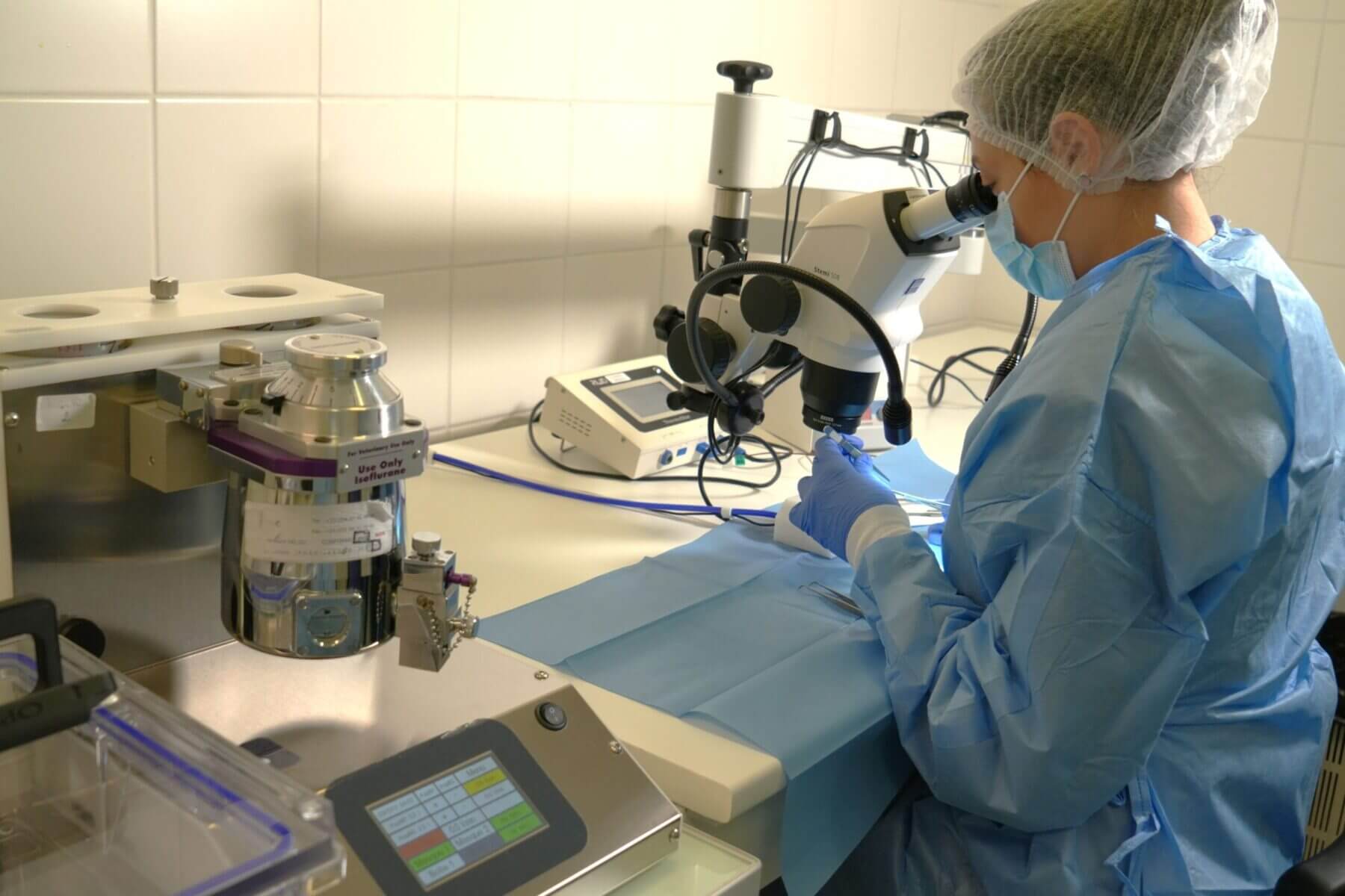 operator with stereotaxy and microsurgery with anesthesia station