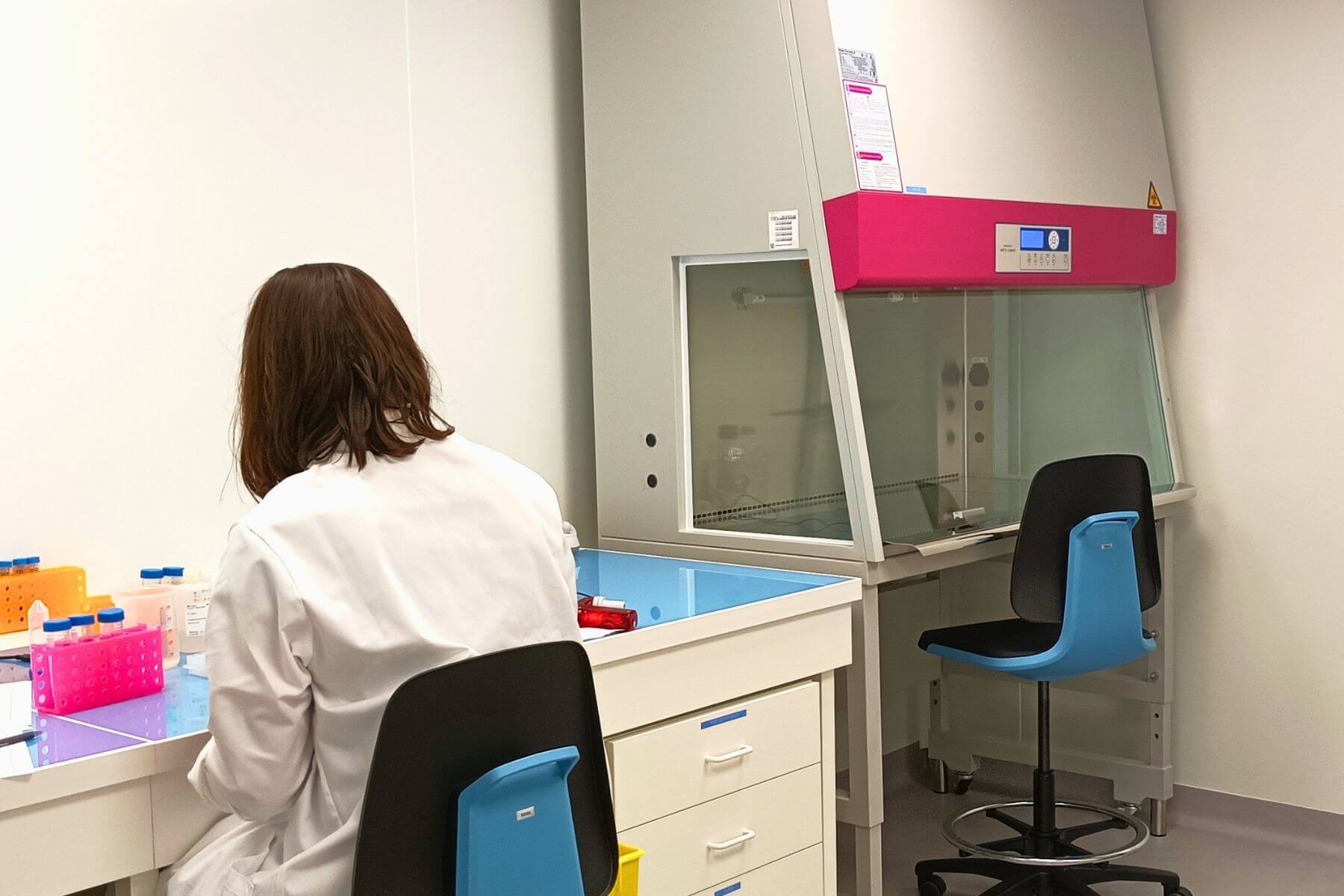 Technician operating at in vitro lab